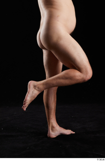 Louis  2 calf flexing nude side view 0003.jpg